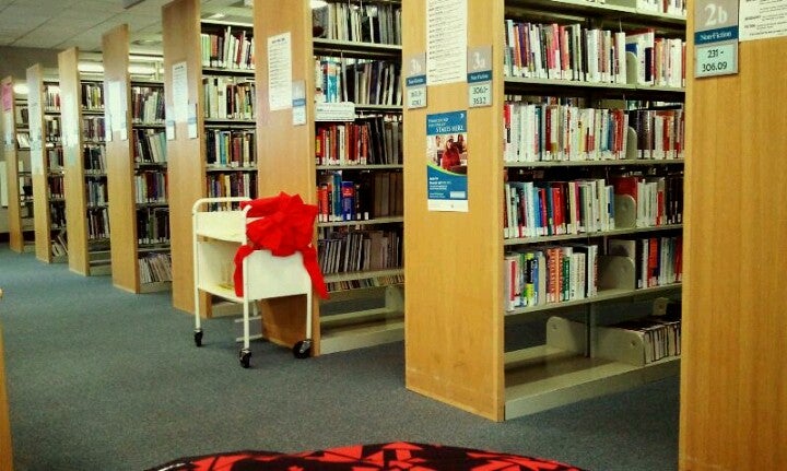 Library shelves filled with books.