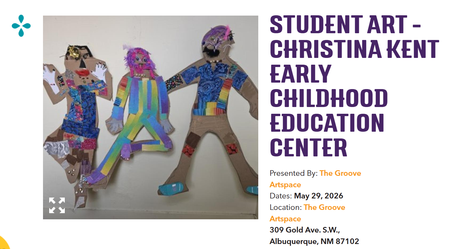 Children's artwork display at educational event.